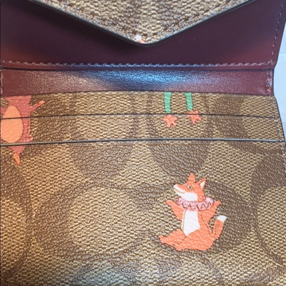NWT Coach limited edition leashed wallet w/mirror